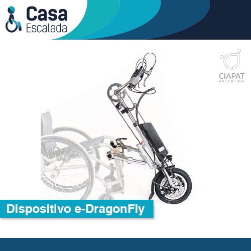 En la imagen se muestra el dispositivo modelo E Dragonfly, colocado al frente de una silla de ruedas. En esta versión del dispositivo se muestra un agregado eléctrico al dispositivo.