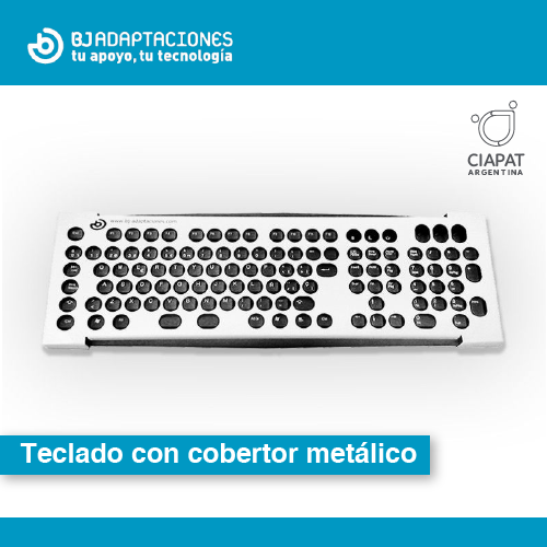 En la imagen se ve el nombre de la empresa, el nombre del producto: Teclado con cobertor metálico y una imagen del mismo, que cuenta con un teclado en el que se ve que encima tiene un cobertor de metal.